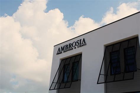 Ambrosia 30a - Ambrosia Pub & Grill American dining and comfort food from the cookbook of the Ambrose Family. Weekly Specials MONDAY: CLOSED Tuesday: Stir Fry ~ Beef, Chicken or Pork $12.95. Shrimp $13.95. Shrimp & Scallops $14.95 ~Comes with soup, salad or Coleslaw~ Wednesday: Pizza Buffet ~ 4:00 - 8:00 P.M. Adult $11.95 ~ Children under 10 $6.95